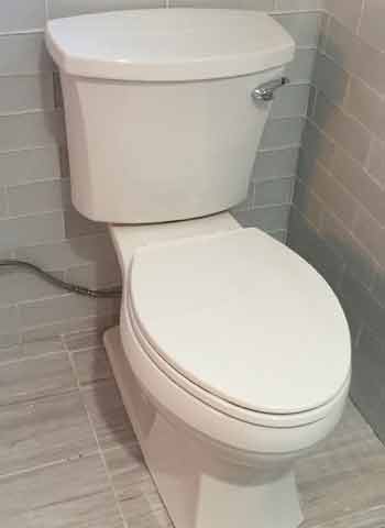 White Porcelain Toilet Installation