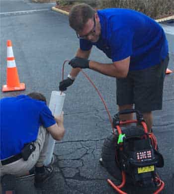 Plumber Using Camera to Inspect Drain Lines