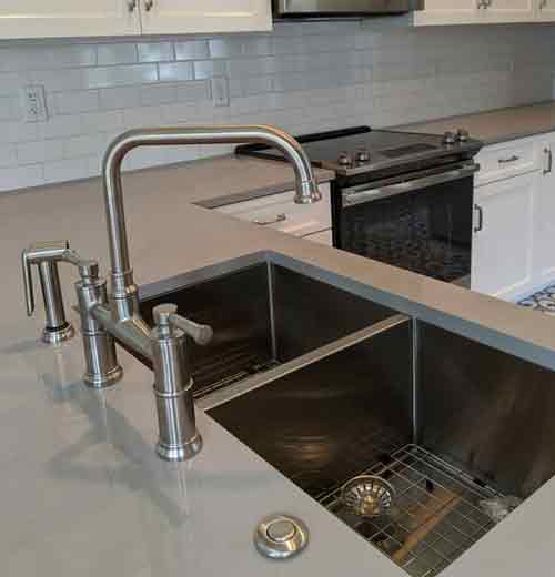 Chrome Kitchen Faucet and Stainless Steel Sink