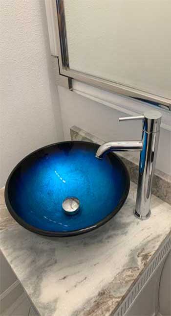 Blue Sink and Faucet Installed by The Best Tampa Plumbers