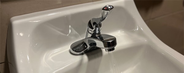 Chrome Bath Faucet with Water Running