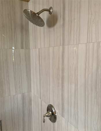 Chrome shower valve and Rain Head shower.