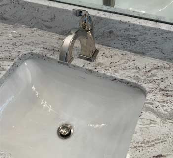 Chrome Bathroom Faucet  installed on marble vanity top
