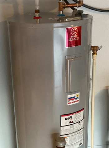 State Brand Electric Water Heater Installation in a Garage in Town N Country, Florida.