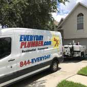 EVERYDAYPLUMBER.com plumbing van with hydro-jetting machine in front of a home in Tampa, FL