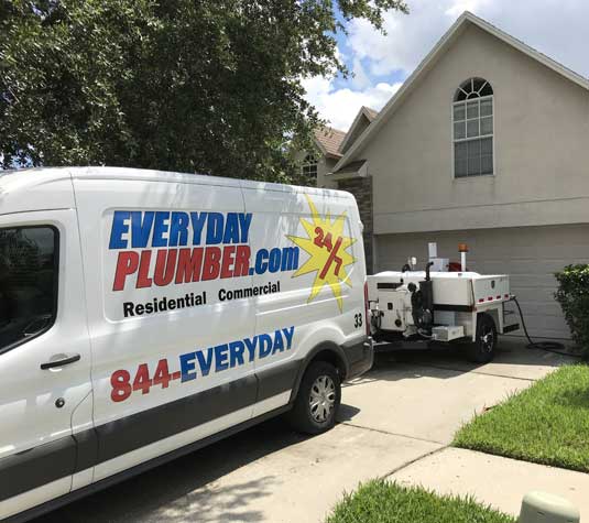 EVERYDAYPLUMBER.com plumbing service van in a residential yard in Temple Terrace