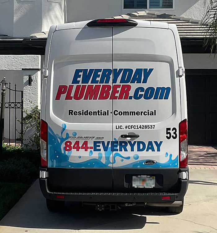 EVERYDAYPLUMBER.com service van in a driveway of a Wesley Chapel home.