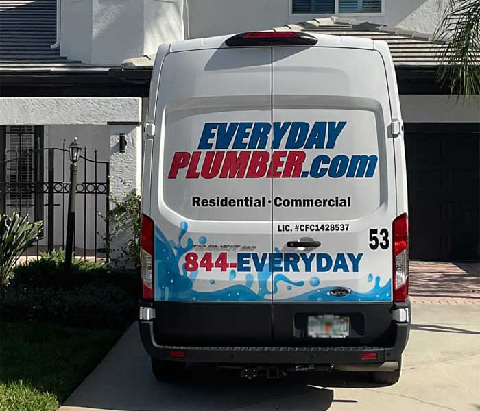 EVERYDAYPLUMBER.com service van in a driveway of an Oldsmar, FL home.