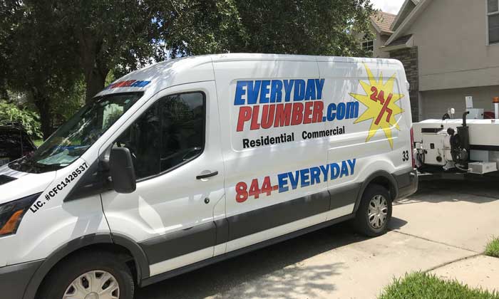 EVERYDAYPLUMBER.com plumbing service van in a residential yard in Valrico, FL