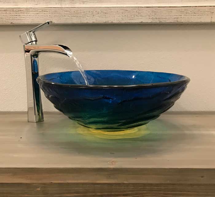 Blue Glass Vessel Sink With Chrome Waterfall Style Faucet