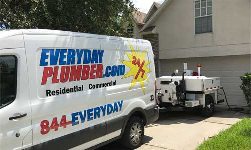 EVERYDAYPLUMBER.com Plumbing Van and Drain Jetting Machine at a Tampa Home.