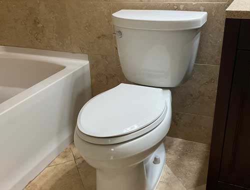 White porcelain toilet in a residential home in Tampa