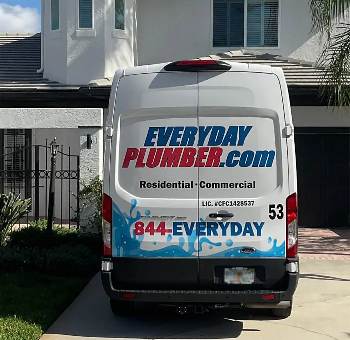 EVERYDAYPLUMBER.com service van parked in a residential driveway for 24/7 emergency plumbing response in Cheval, FL.
