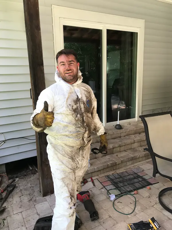 friendly plumber giving thumbs up after completing tough plumbing job in Tampa