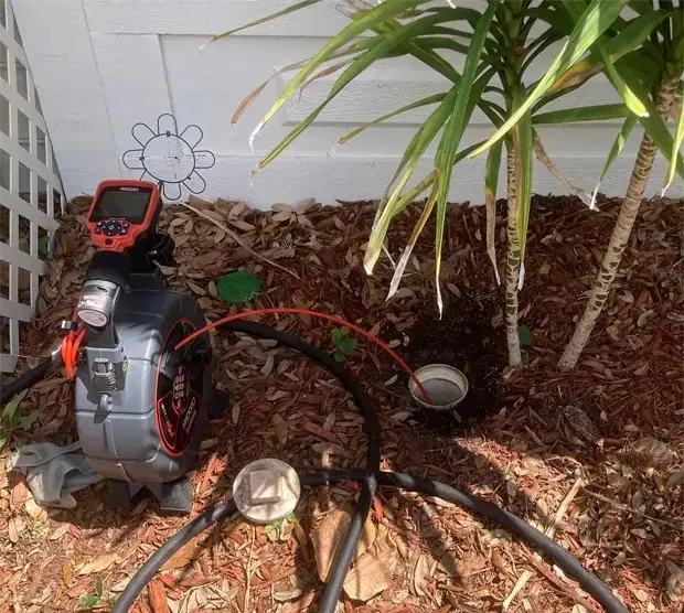 Sewer camera inspection at exterior cleanout to locate drain line issues in St. Petersburg by EVERYDAYPLUMBER.com
