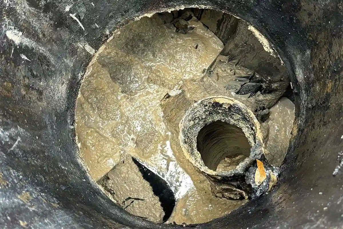 Severely blocked drain pipe packed with grease and debris — hydro jetting service by EVERYDAYPLUMBER.com in Tampa Bay