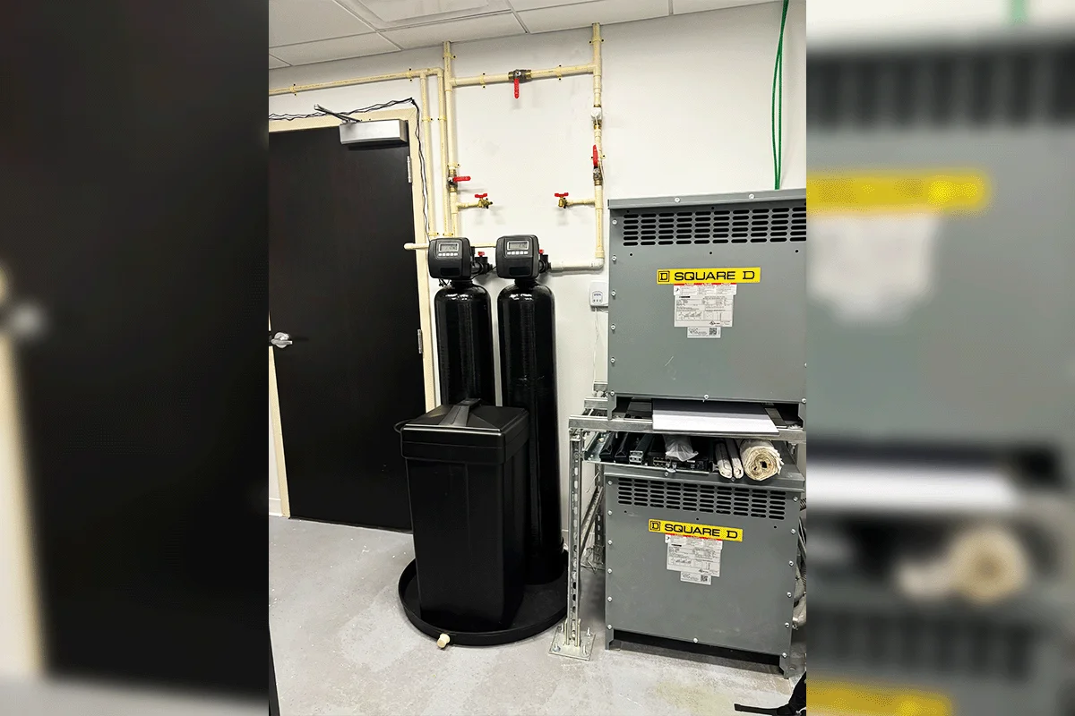 Dual-tank commercial water softener system installed by EverydayPlumber.com in a Tampa Bay commercial utility room