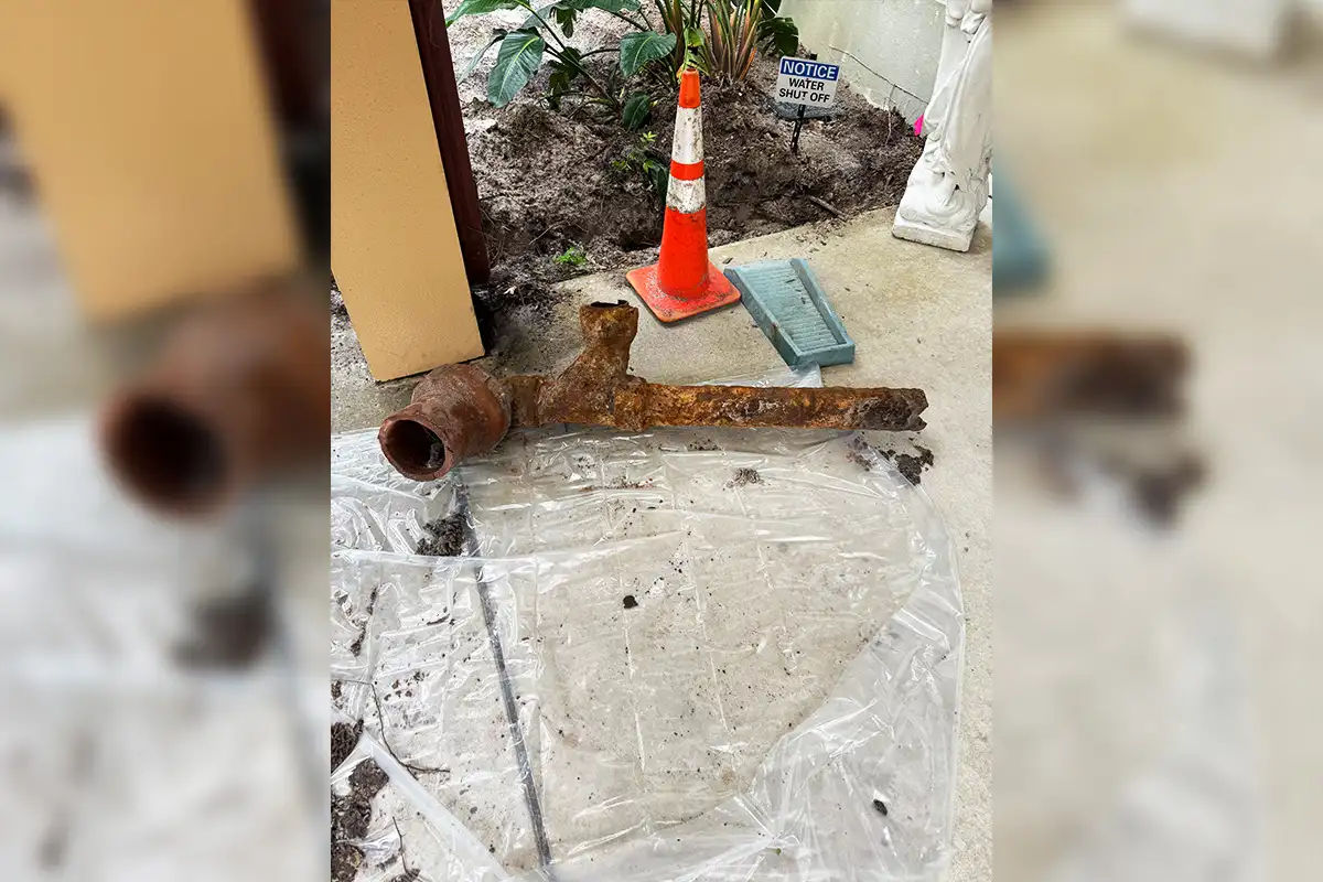 Failed cast iron sewer pipe with clay pipe connection removed from a Tampa Bay property during sewer line repair by EverydayPlumber.com