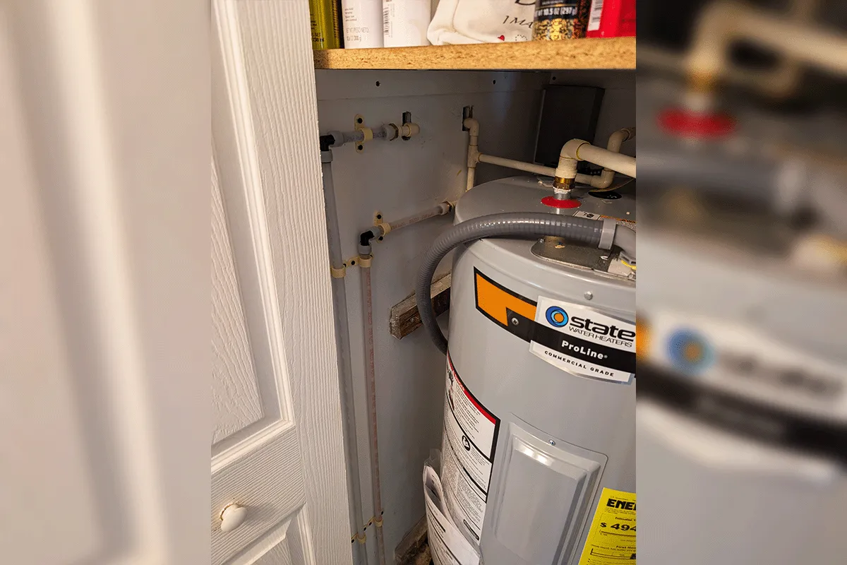 New CPVC supply line connections at a residential water heater during a whole house repipe by EverydayPlumber.com in Tampa Bay