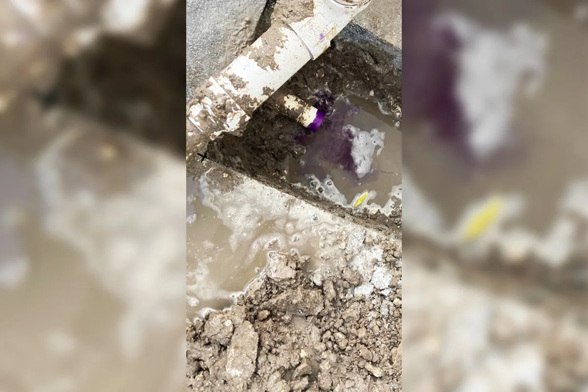 Failed sewer pipe joint with active water intrusion and sewage pooling in an excavated trench prior to repair by EverydayPlumber.com in Tampa Bay