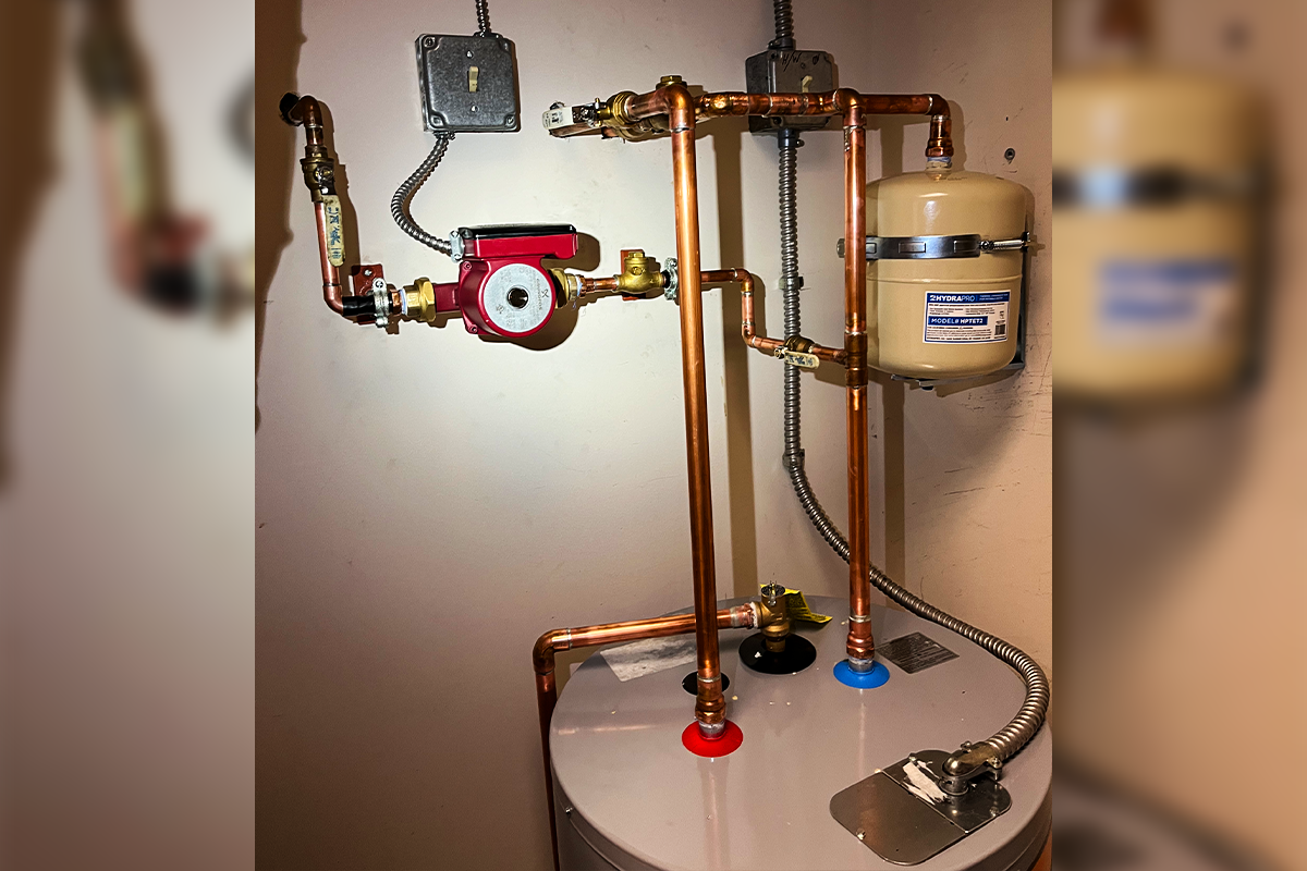 Residential water heater installation with copper recirculation pump and expansion tank — water heater repair and replacement Carrollwood FL — EVERYDAYPLUMBER.com Tampa Bay