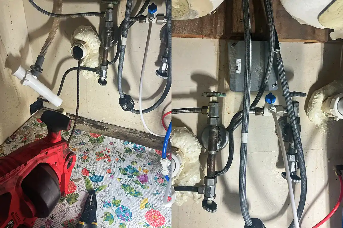 Plumbing tools and exposed supply lines during a kitchen sink service call — garbage disposal and plumbing repair — EVERYDAYPLUMBER.com Tampa Bay