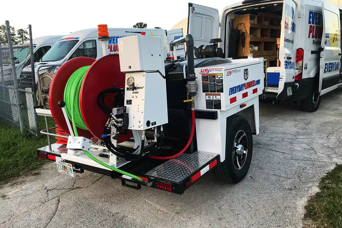 edp-hydro-jetting-trailer-equipment-2026 EVERYDAYPLUMBER.com hydro jetting trailer with hose reel attached to service van — hydro jetting and drain cleaning — EVERYDAYPLUMBER.com Temple Terrace