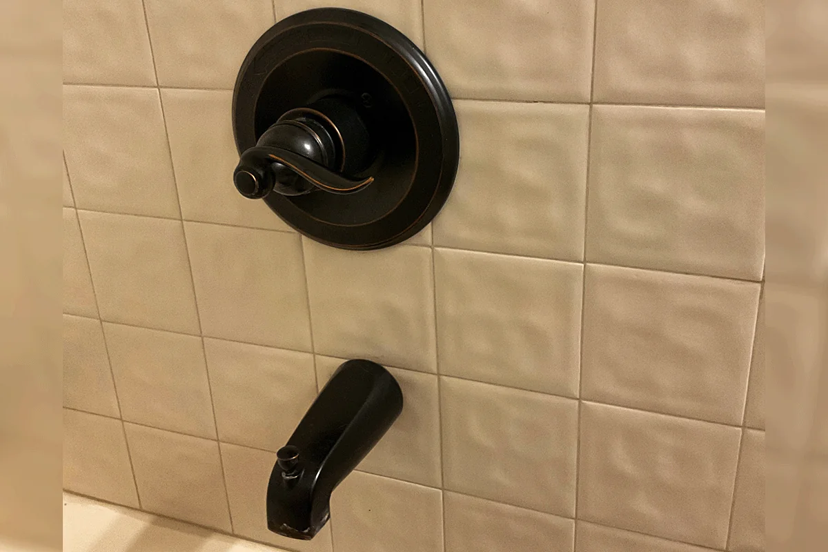 edp-oil-rubbed-bronze-valve-repair-2026 Oil-rubbed bronze single-handle shower valve and tub spout — tub and shower valve repair — EVERYDAYPLUMBER.com Tampa Bay