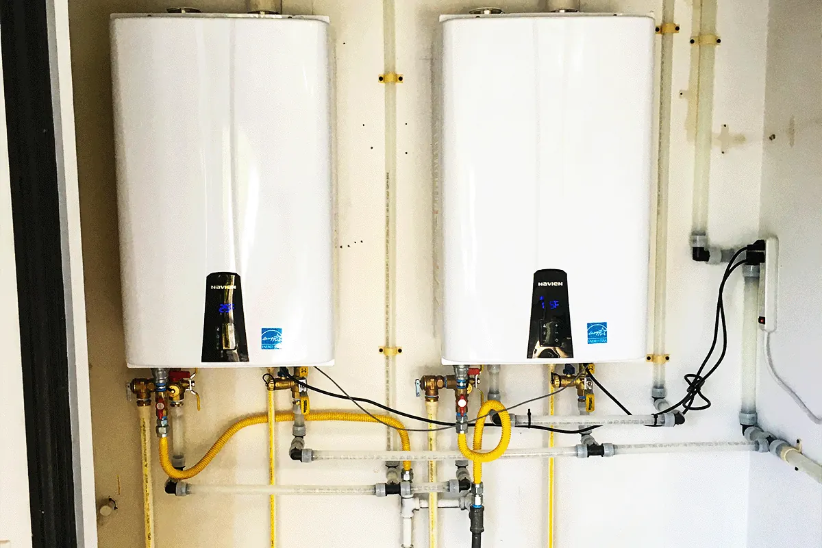 edp-tankless-water-heater-install-lutz-2026 Two tankless water heaters installed in a Lutz home — water heater installation — EVERYDAYPLUMBER.com